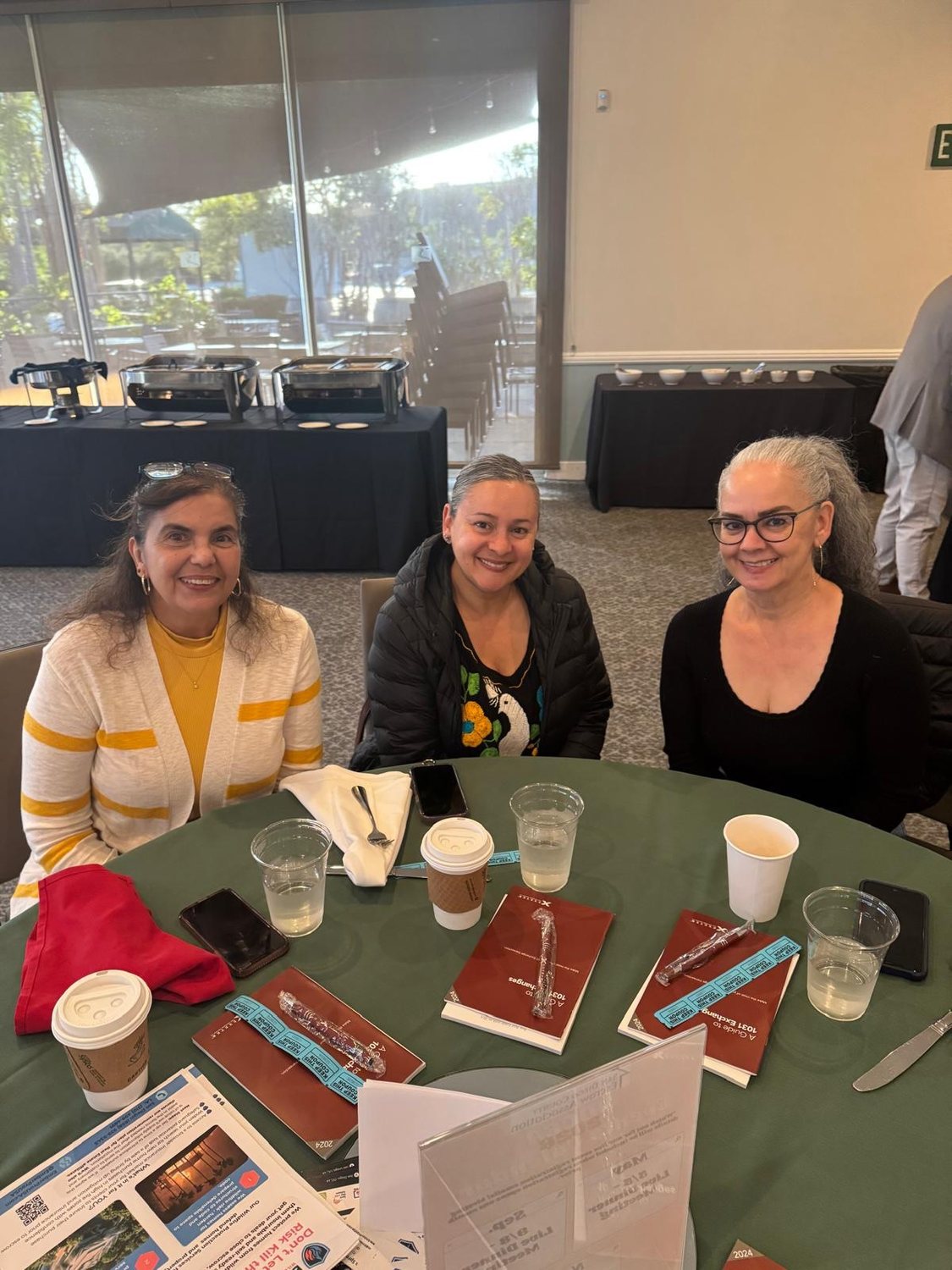 Members at an education event table